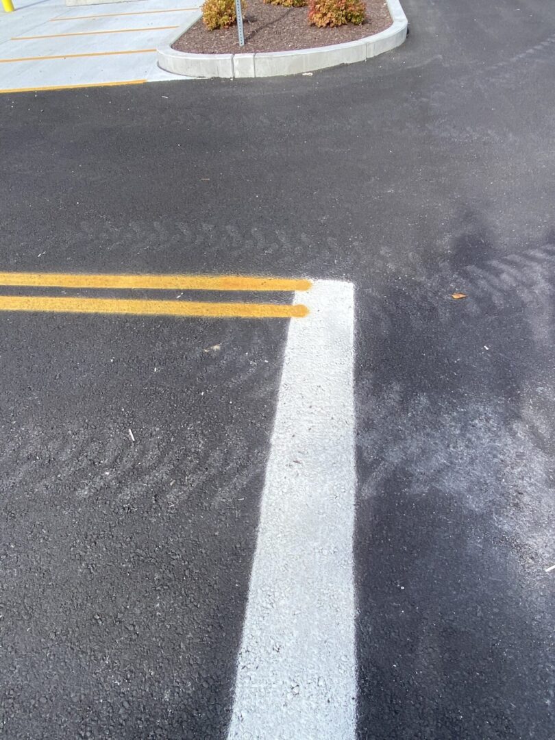 White and yellow marking on plain road